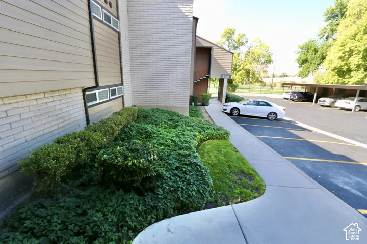 Building exterior showing covered and uncovered parking