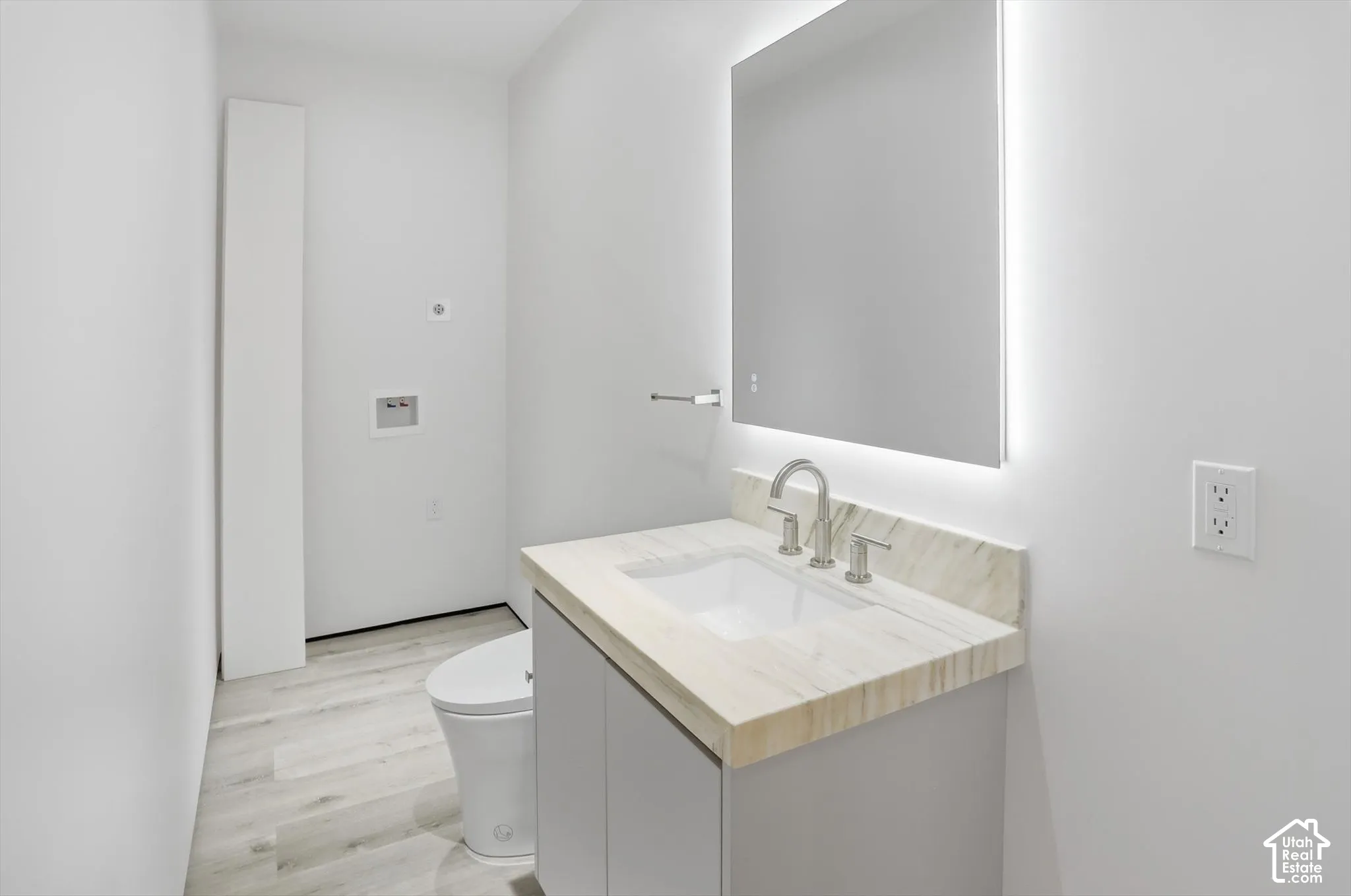 Powder & Laundry room in downstairs 2 bedroom apartment