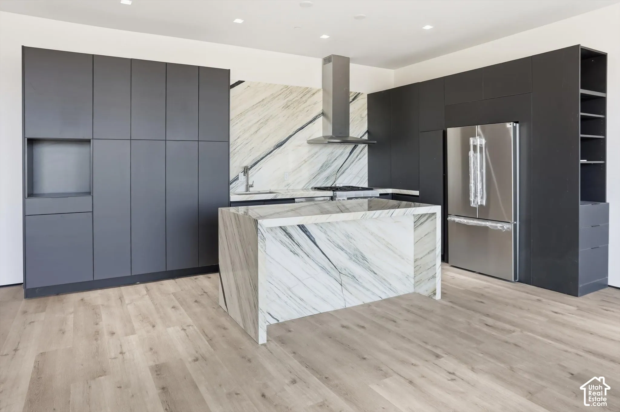 Downstairs 2 bedroom apartment kitchen featuring quartzite countertops
