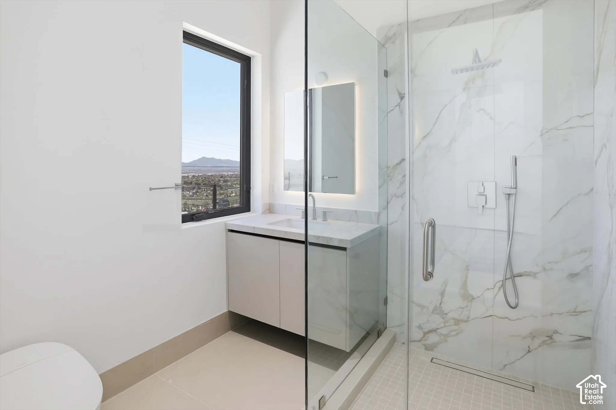 On suite bathroom in one of three main level bedrooms