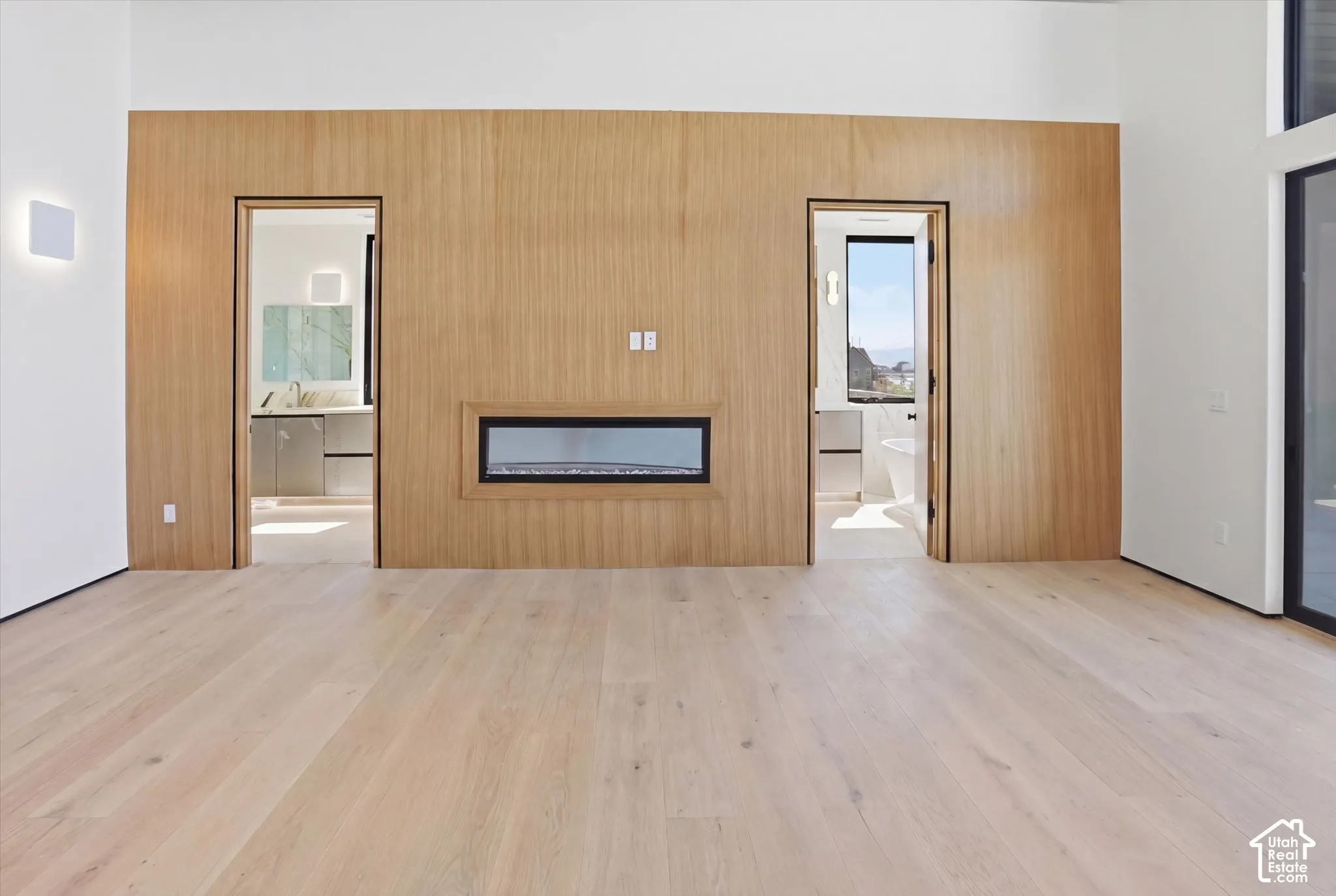 Primary bedroom with double bathrooms