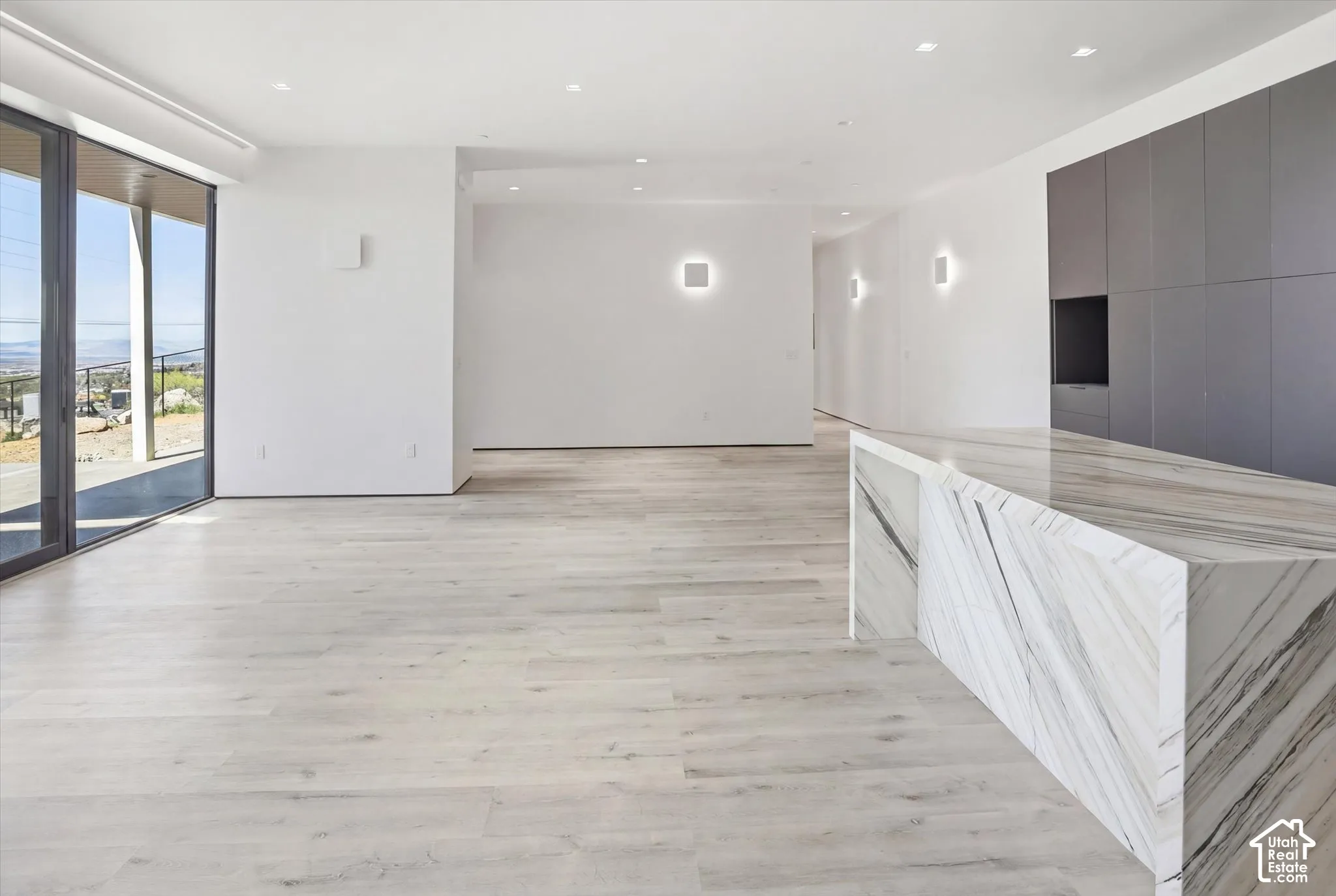 Downstairs 2 bedroom apartment kitchen with sliding door and front door to front patio