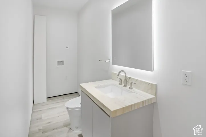 Powder & Laundry room in downstairs 2 bedroom apartment