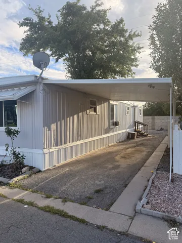Carport structure providing covered parking