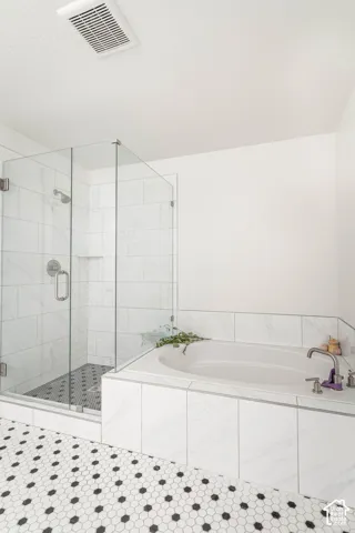 Primary bathroom with seperate tub and shower
