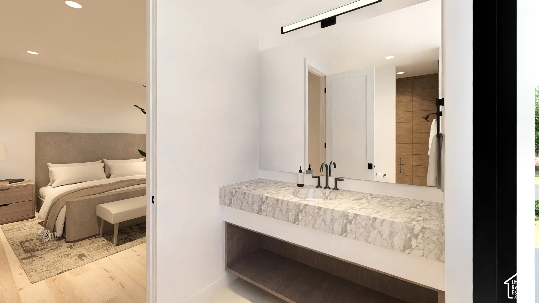 Floating vanity with a stone countertop, integrated sink, and black matte faucet