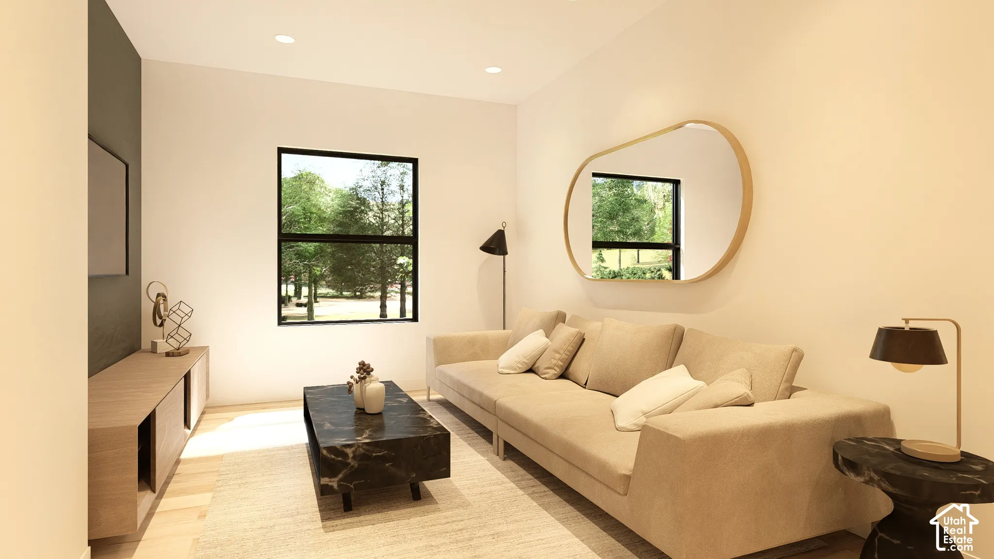 Recessed lighting, wood-finish flooring, a wall-mounted media console, and a large window featuring outdoor scenery