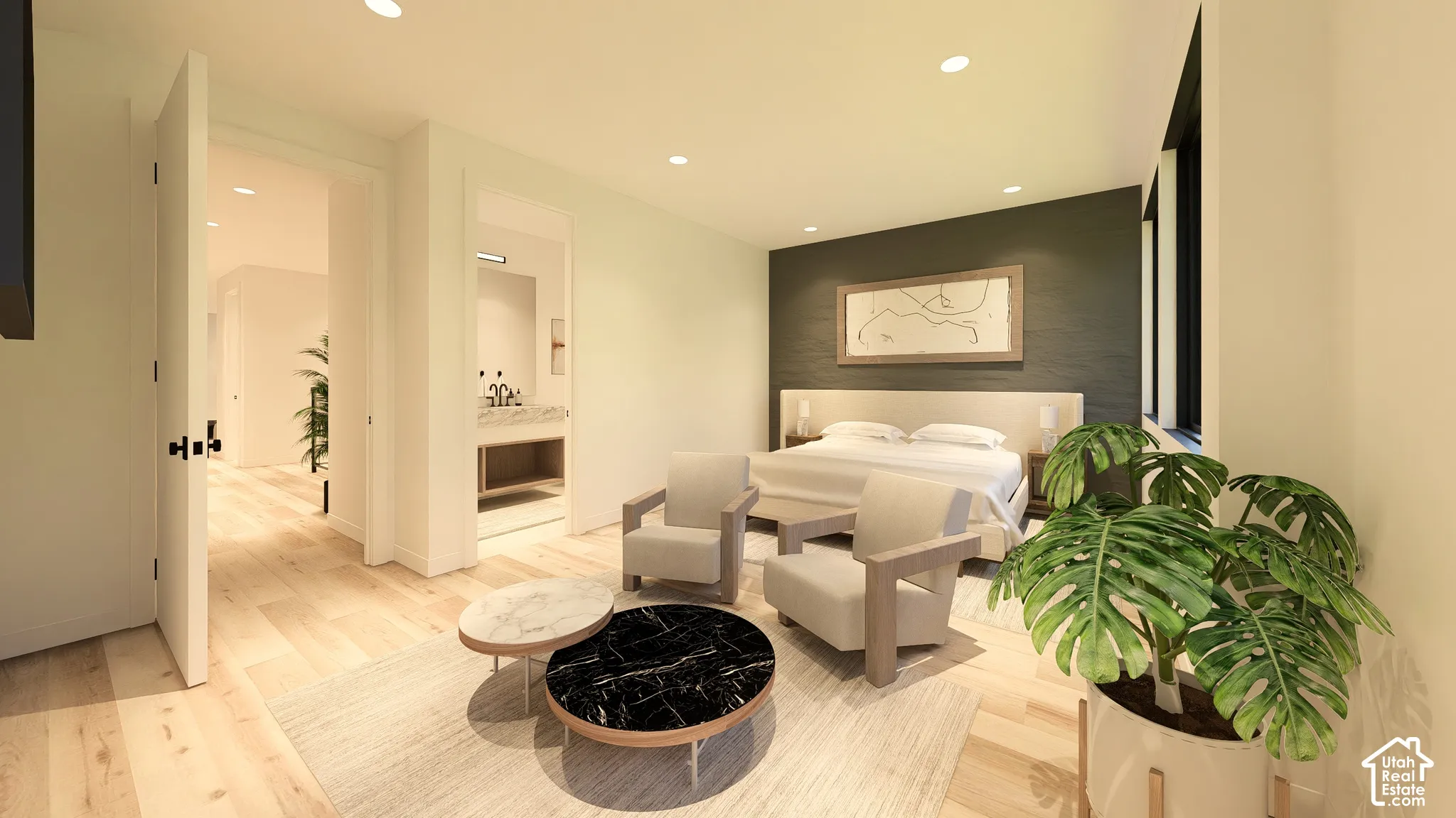 Recessed lighting throughout, light wood-finish flooring, and a dark accent wall