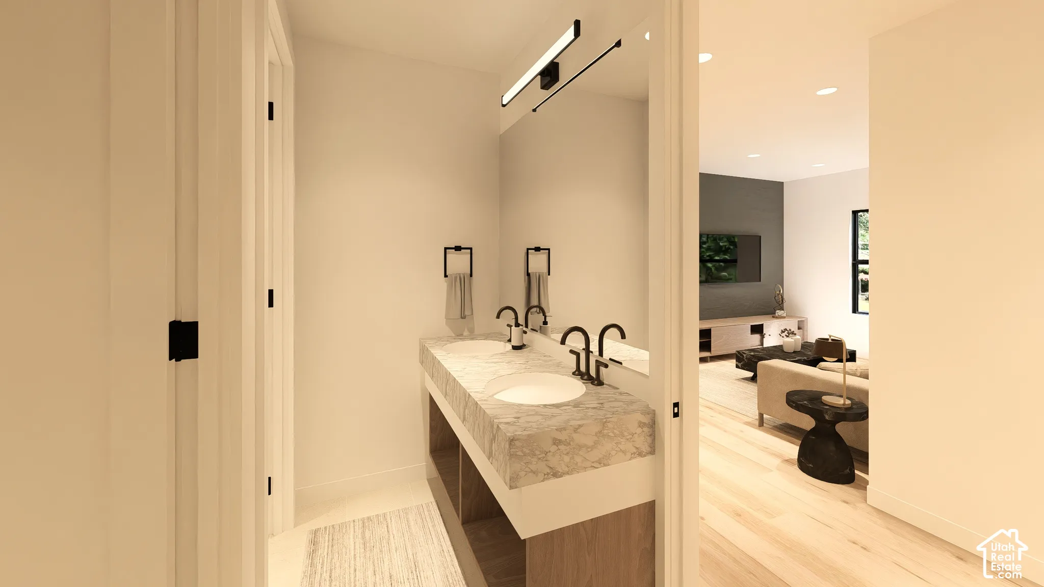 Dual vanity with a stone countertop and integrated sinks
