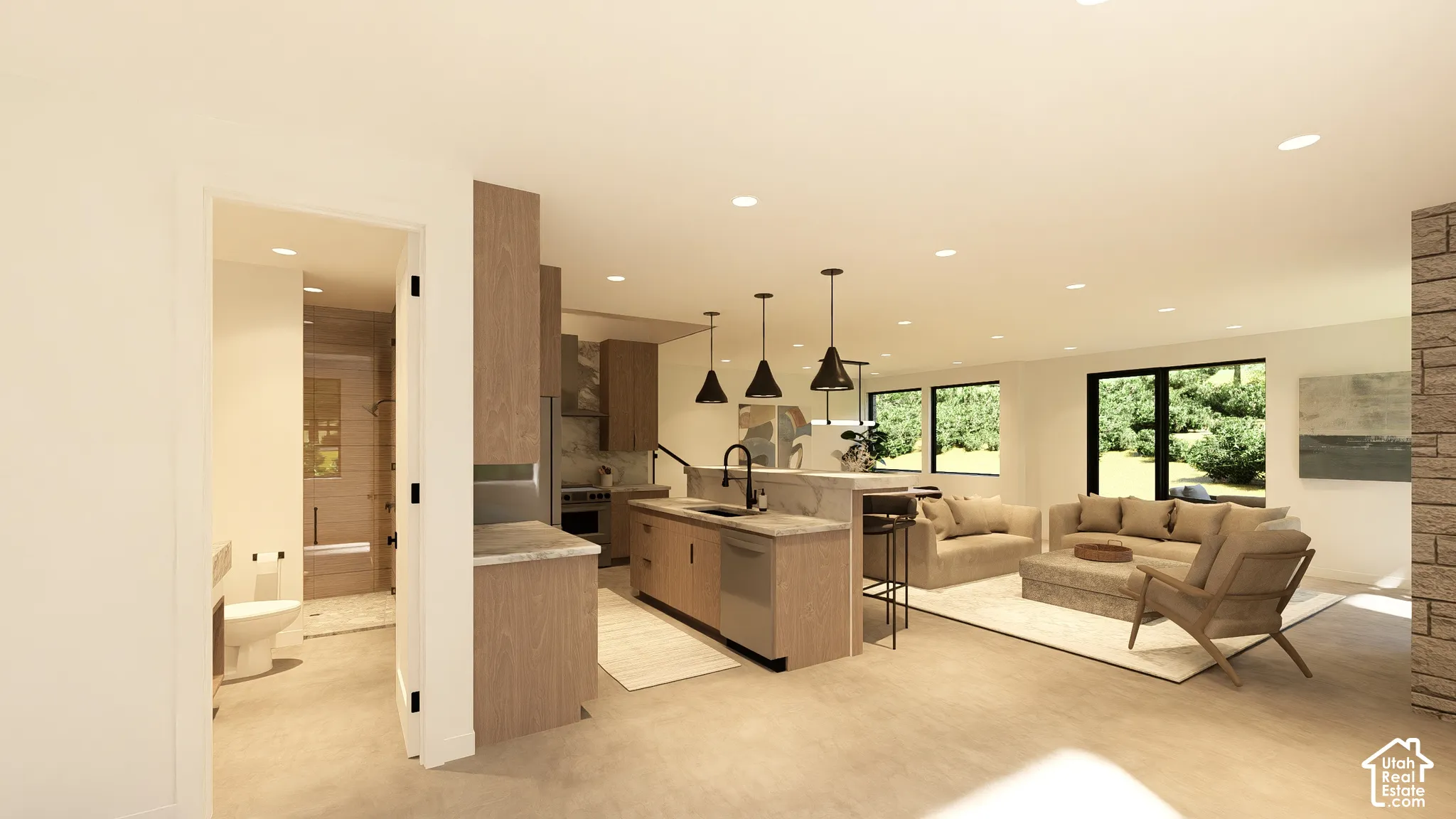 Open concept living area featuring a kitchen island with pendant lighting, a built-in dishwasher, and ample natural light through large windows
