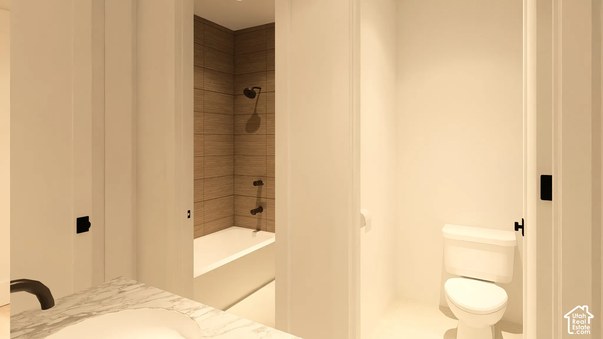 White vanity with a subtle marble-patterned countertop, an undermount sink, and a black faucet