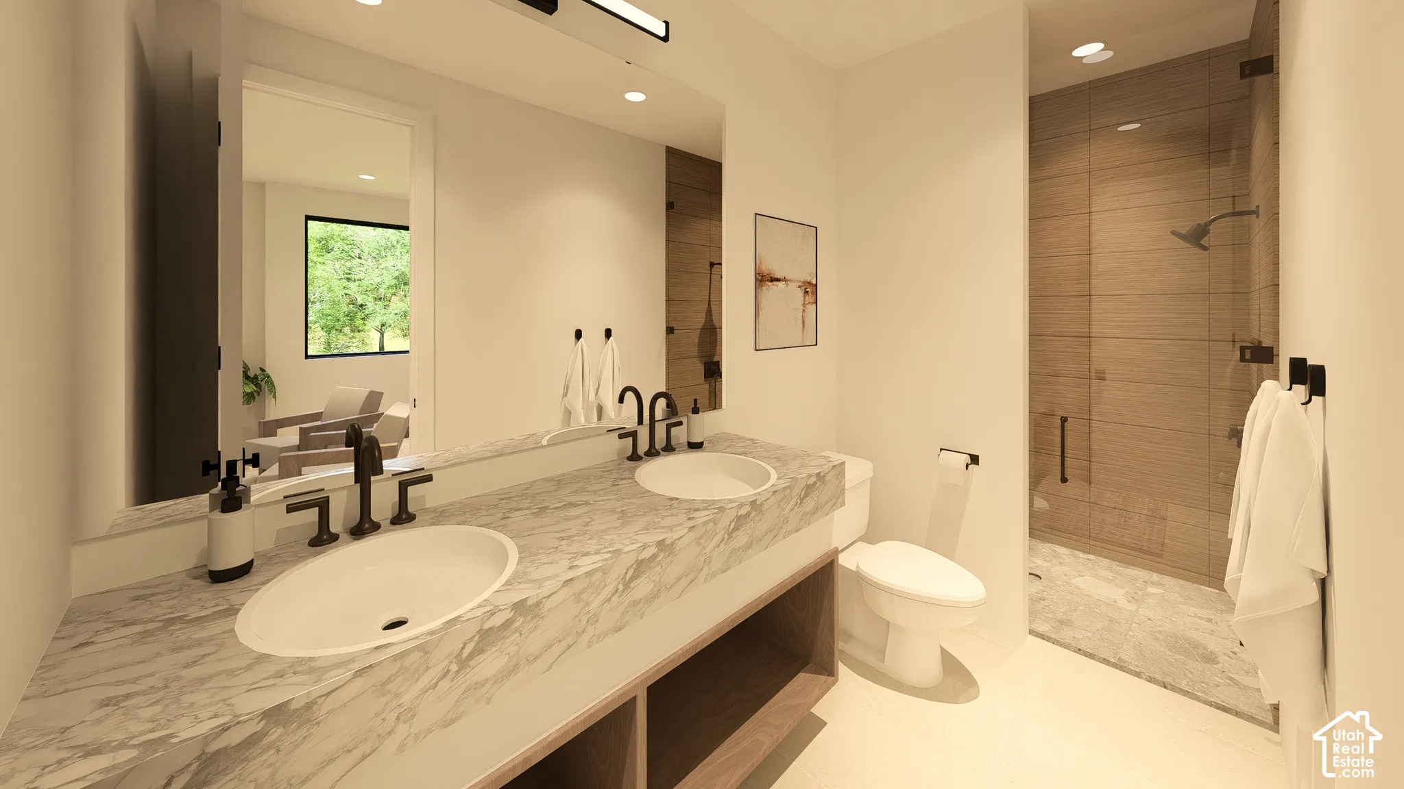 Dual vanity featuring undermount sinks and a stone countertop
