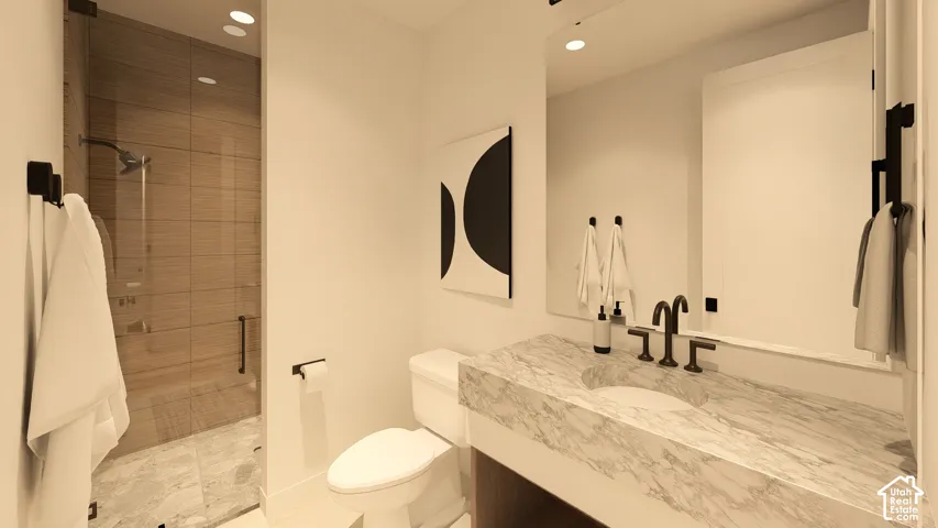 Walk-in shower with clear glass enclosure and linear tile, single vanity with integrated sink, stone countertop, matte black fixtures, and recessed lighting