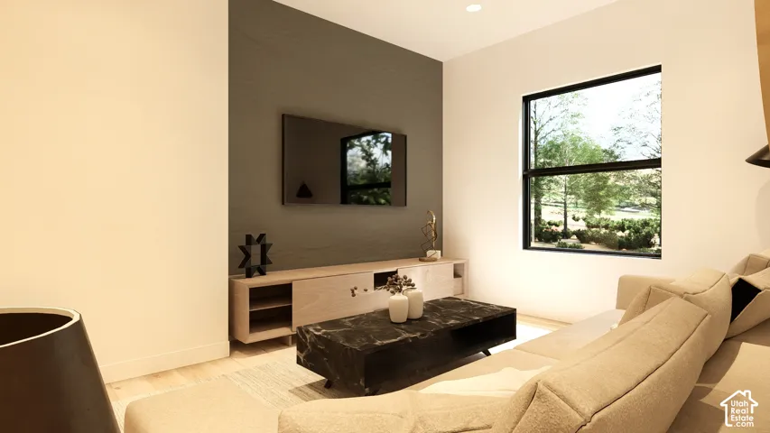 Recessed ceiling lighting, a large window with black framing, wood-finish flooring, a wall-mounted television, and a built-in media console
