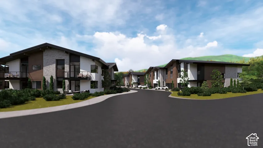 Modern architectural style with multi-textured facades, private balconies, an asphalt driveway, and landscaped grounds