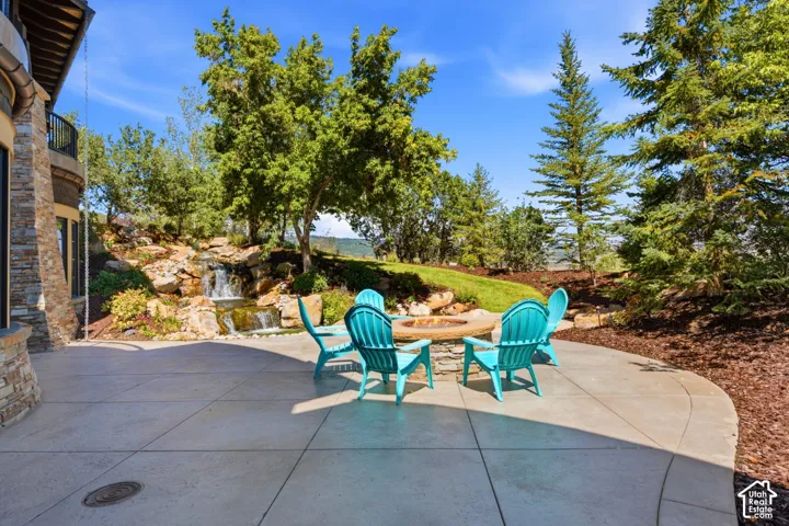 Enjoy smores at the outdoor fire setting or relax to the babbling sound of the water fall just outside the lower level Family Room.