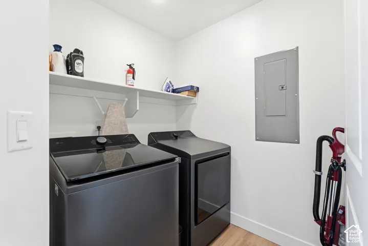 White walls with light wood-finish flooring