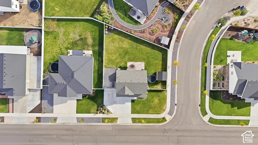 Well-defined property lines with mature landscaping and maintained green spaces