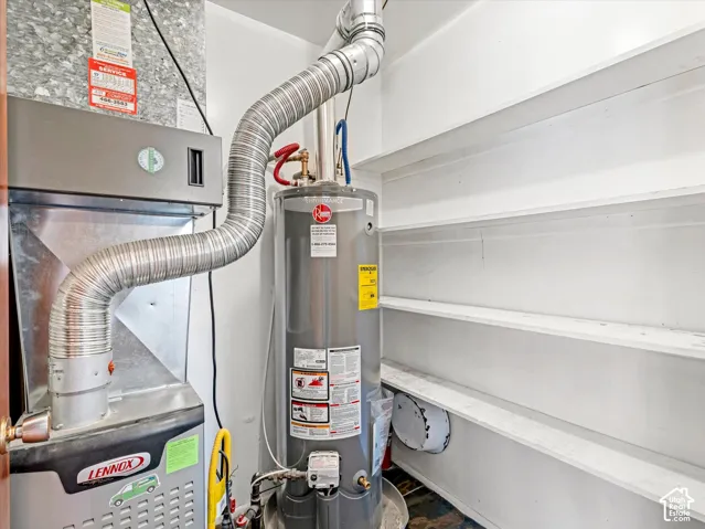 Built-in shelving, Lennox furnace, and water heater