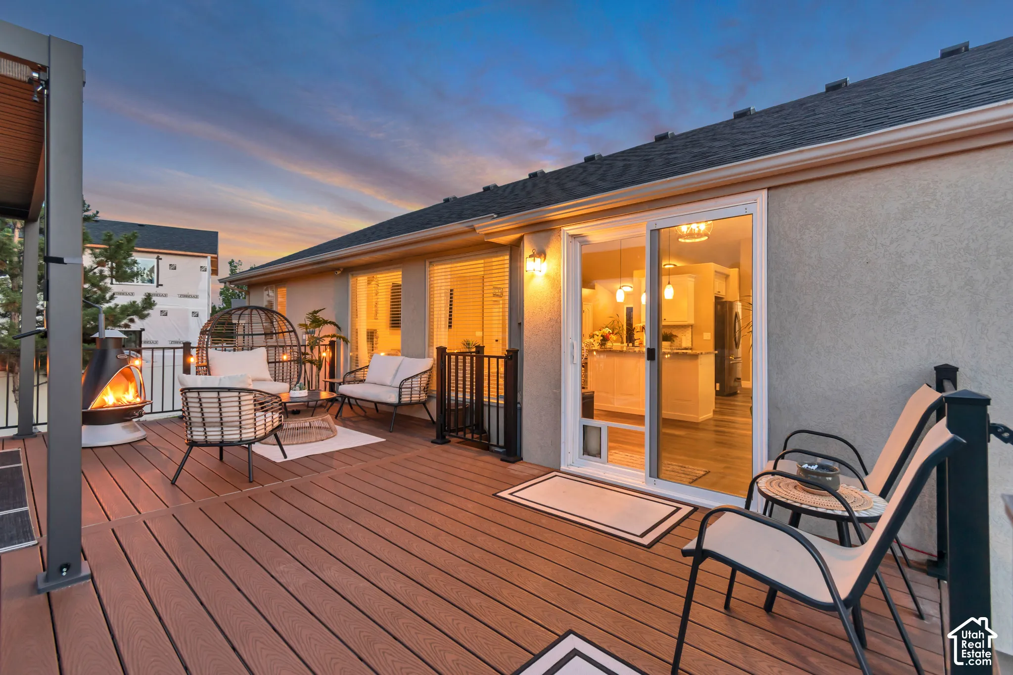 Expansive outdoor deck with composite decking and a built-in pergola structure