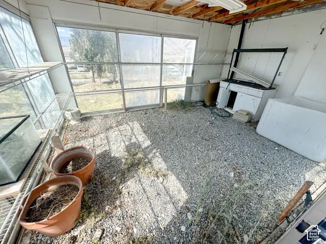 Sunroom with a sink.