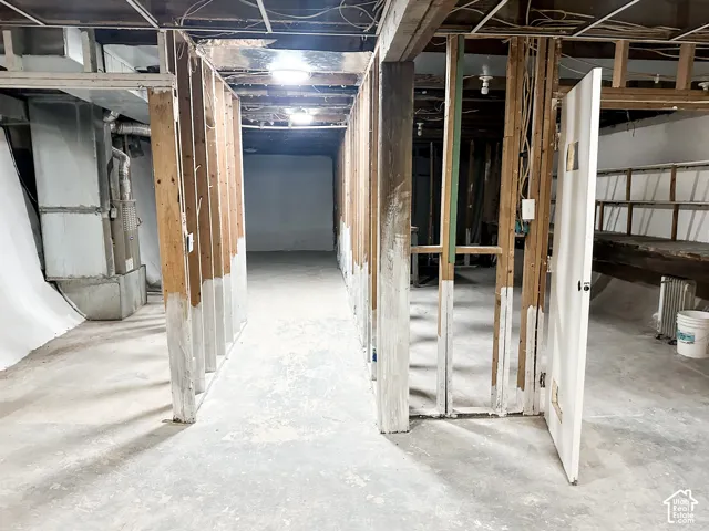 Basement with a furnace.