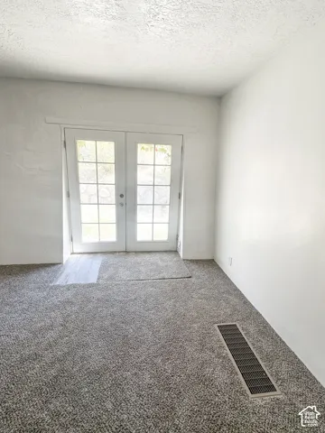 East living room back door to patio.