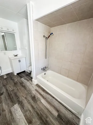 West bathroom with washer and dryer hookups. Brand new water heater.
