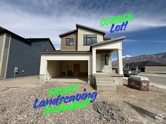 Modern architectural style featuring a front porch with square columns, a two-car garage, and a combination of horizontal siding and stucco exterior finishes