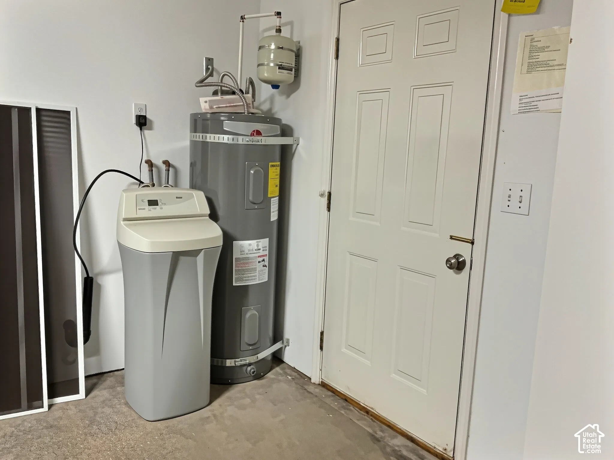 Water softener system, water heater, panel door, and light switches
