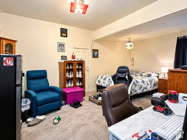 Additional contentThis photo shows a furnished residential room with removable items (furniture, rugs, artwork, and personal belongings) that dominate the space