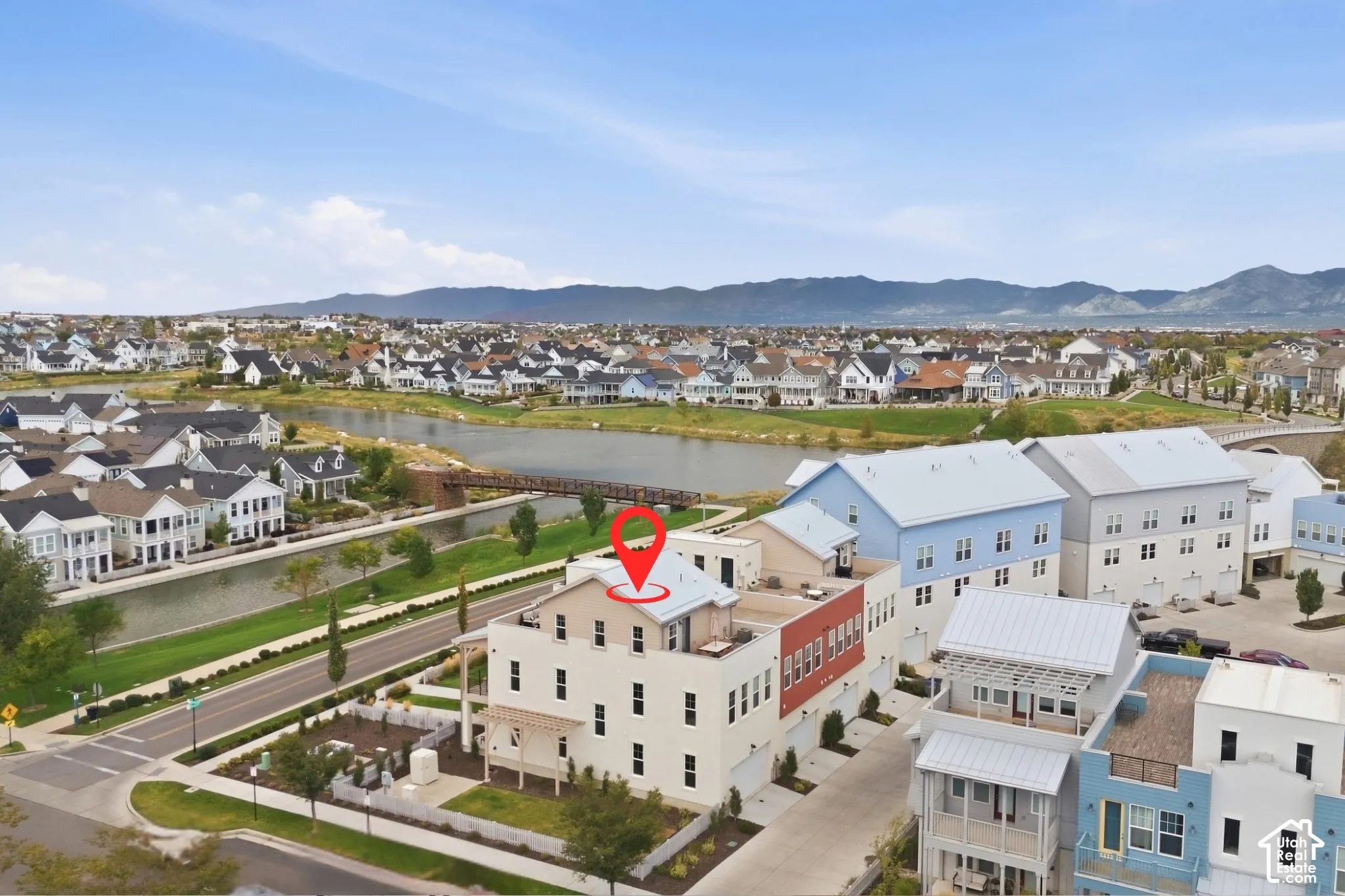 Aerial perspective showcasing a multi-story residence with a flat roof
