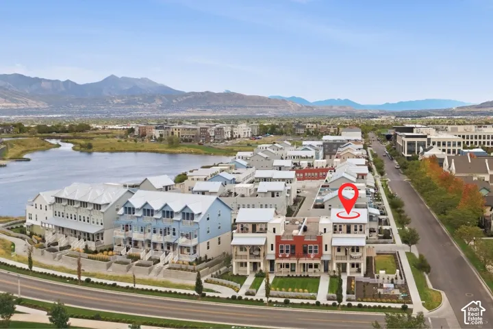 Townhome community with contemporary architecture, multi-level residences, and landscaped green spaces