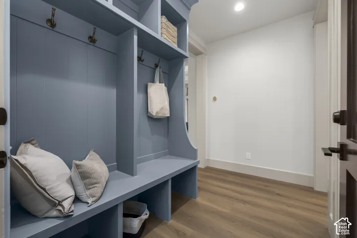 Built-in mudroom bench with shelving and storage cubbies