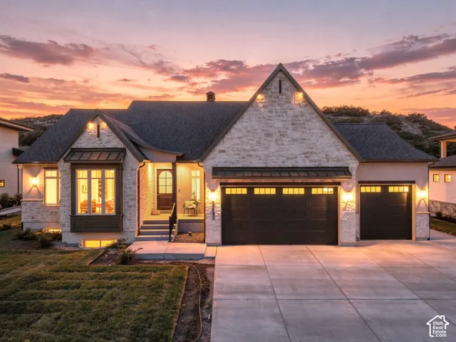 Stone veneer facade with dark trim accents