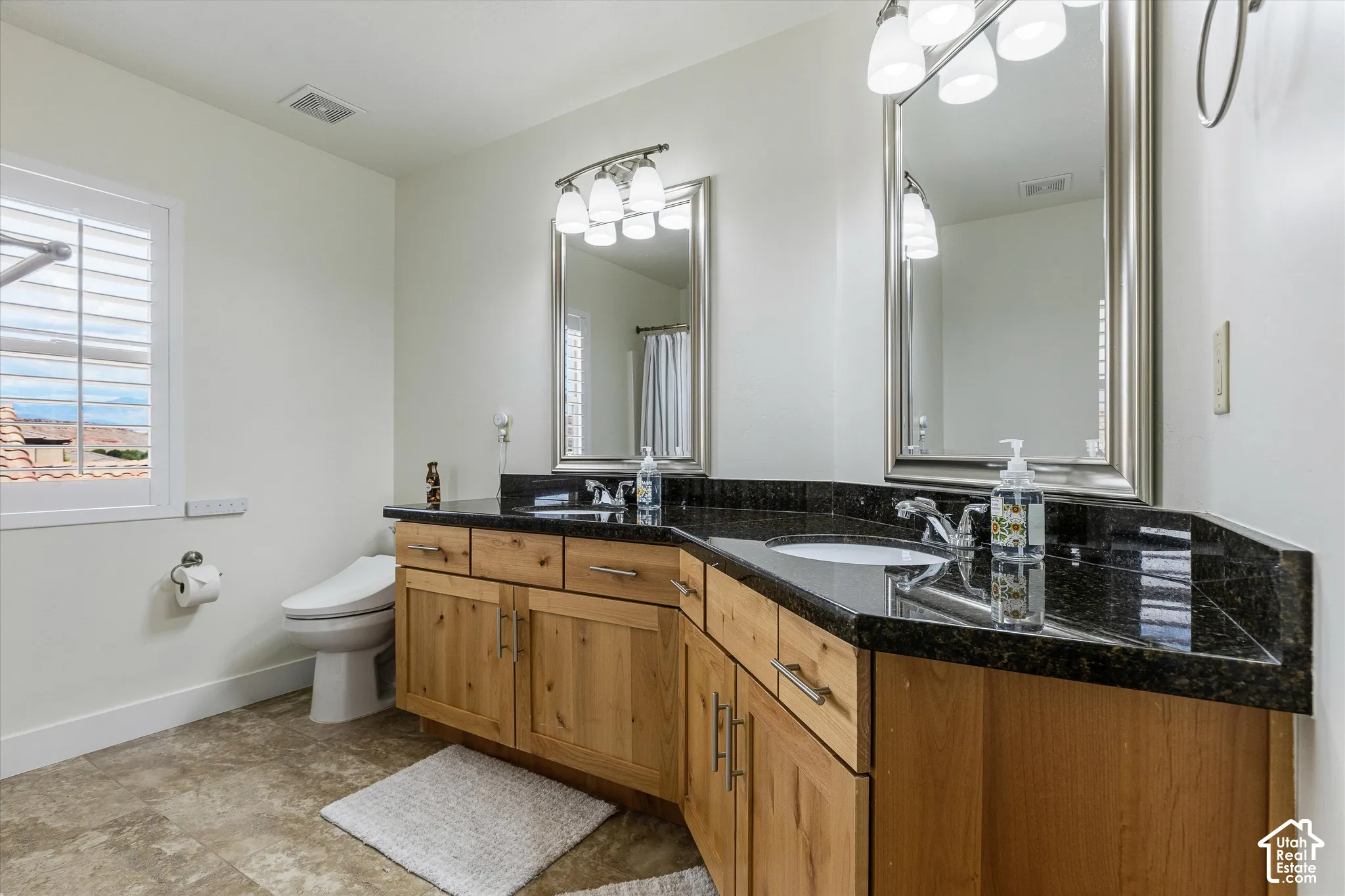 2nd Level Full Bath with dual sinks.