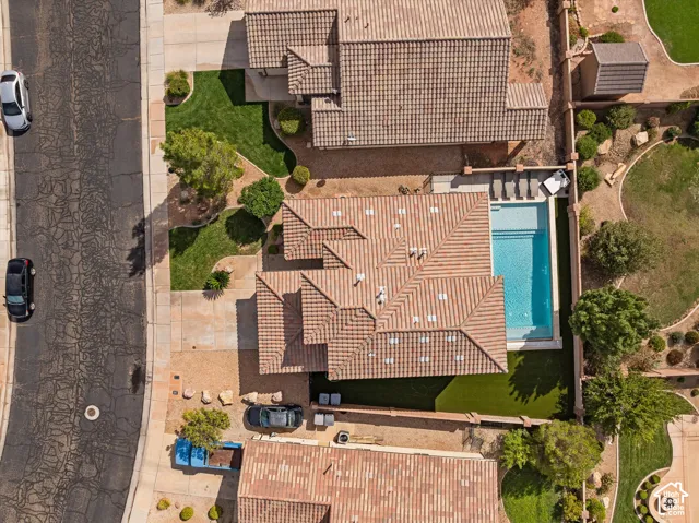 Tile roofing, private swimming pool, artificial turf, and mature landscaping
