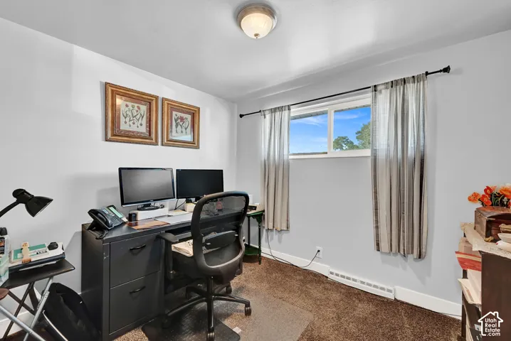 Recessed window with exterior scenery, overhead semi-flush mount lighting fixture, and carpeted flooring