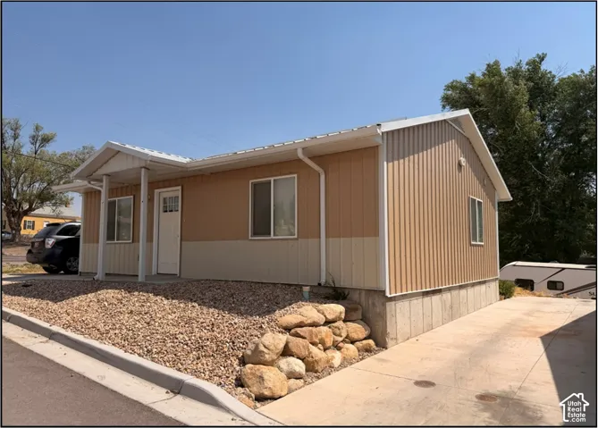 Two-tone exterior siding with white trim