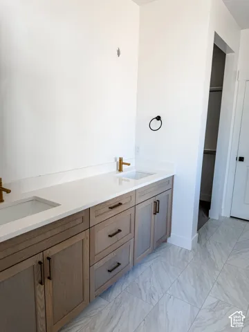 Primary bathroom  will have glass doors around the walk in shower as well as mirrors installed.