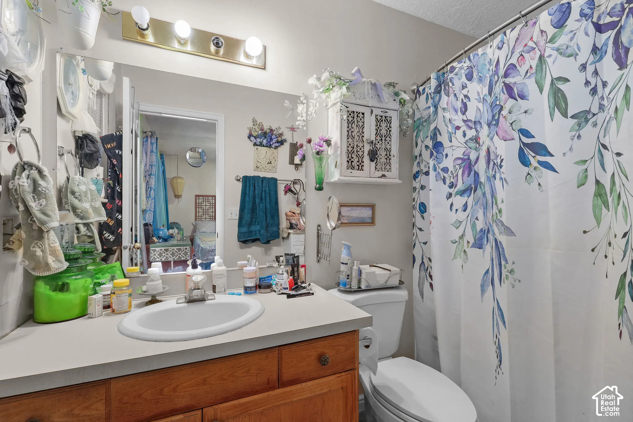 Unit A, En-suit bathroom, solid surface countertop, and an integrated oval sink