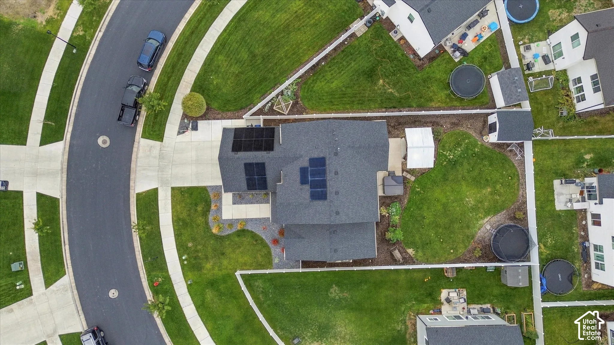 Asphalt shingle roof with integrated solar panels