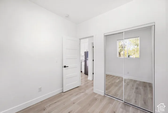 Wood-finish flooring with white walls