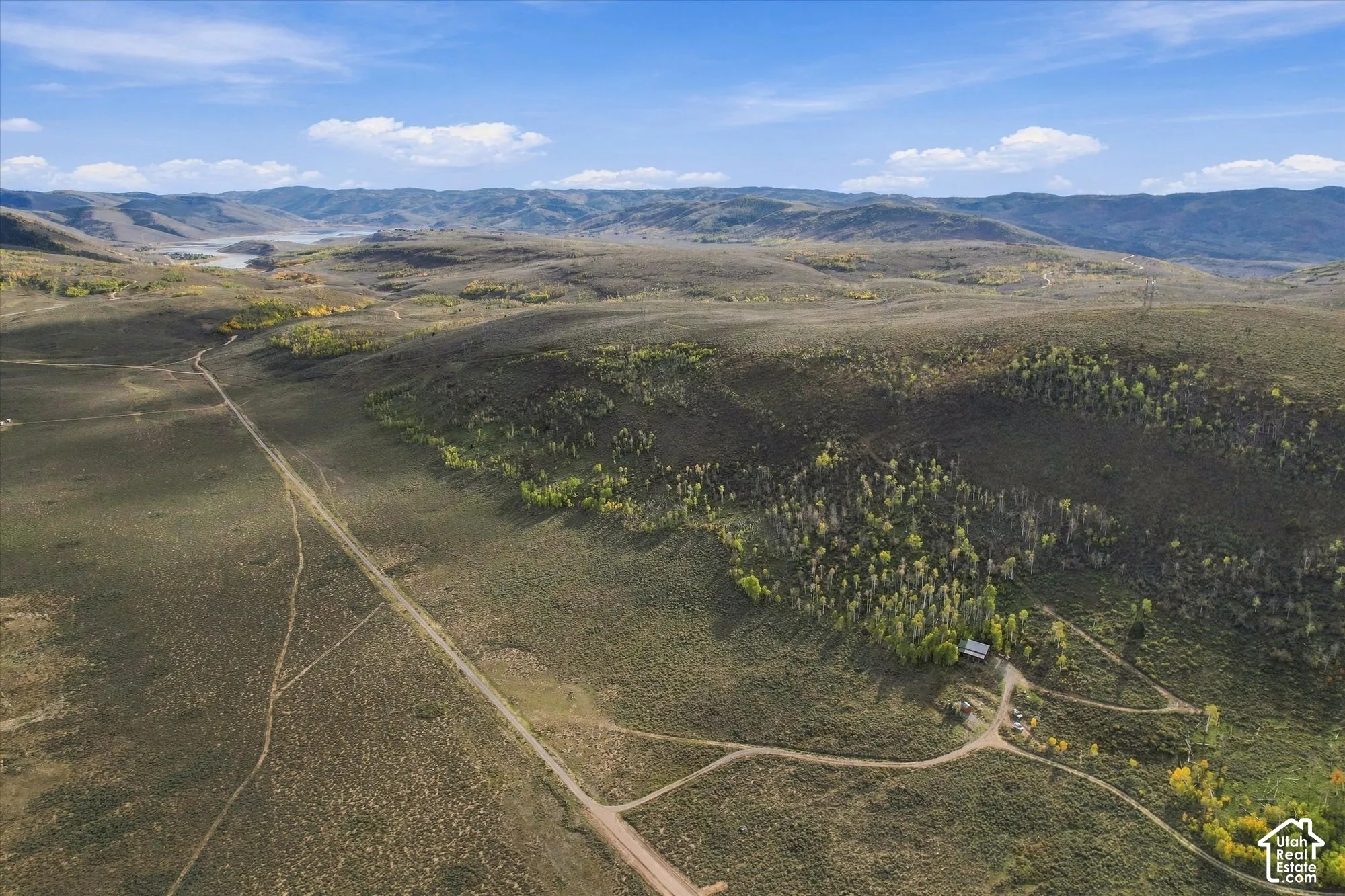 Expansive natural landscape with varied terrain and distant mountains