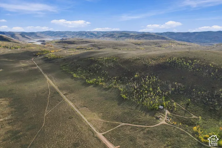 Expansive natural landscape with varied terrain and distant mountains