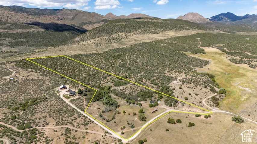 Expansive acreage featuring natural vegetation and mountainous terrain