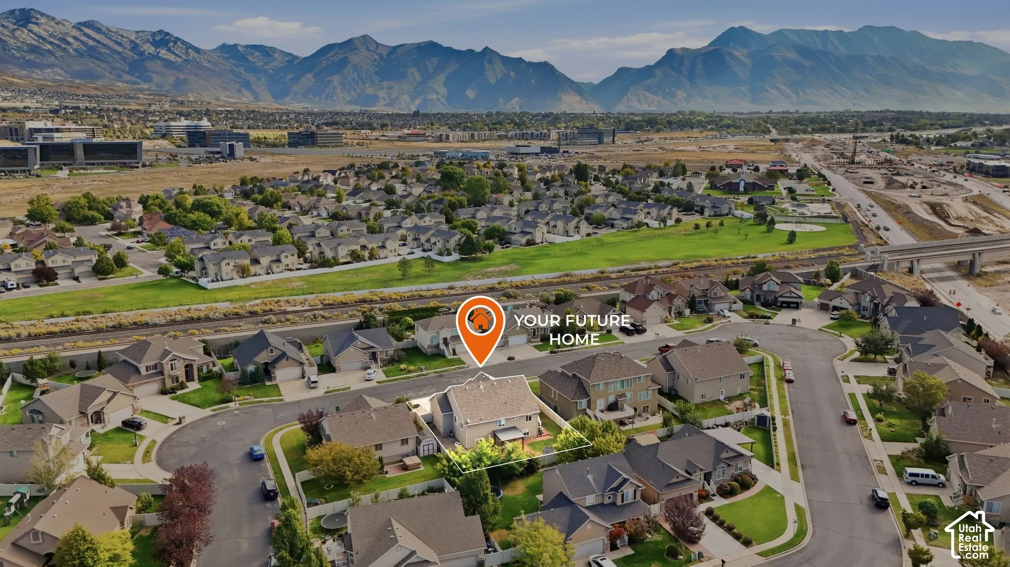 Residential neighborhood setting with mountain backdrop