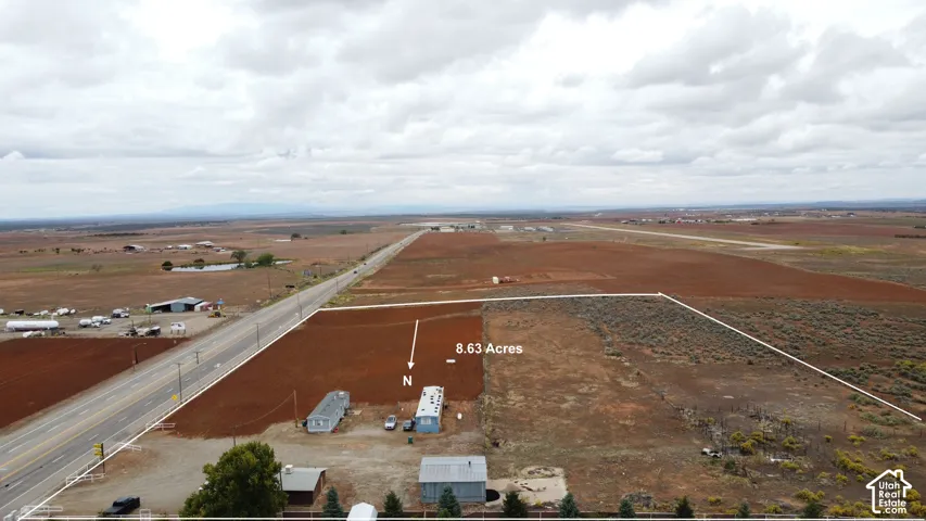 8.63 acre parcel featuring open land, roadside frontage, and distant mountain scenery