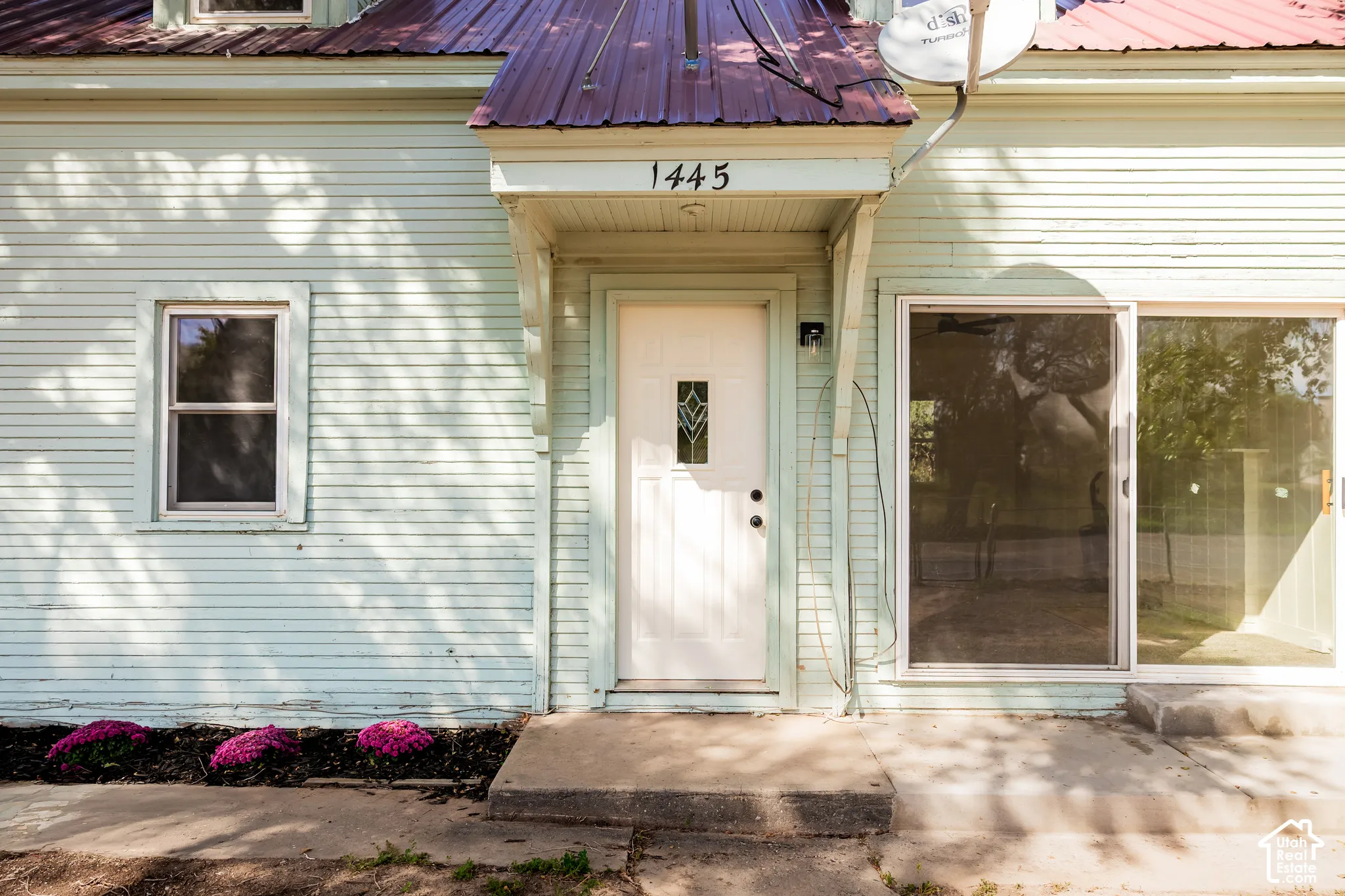 Light blue horizontal siding facade