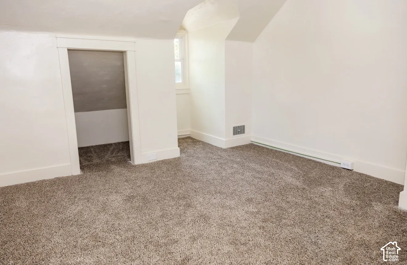 Neutral-toned carpeting throughout